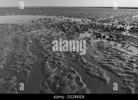 Modelli nella sabbia, Worthing Beach, Sussex, Regno Unito Foto Stock