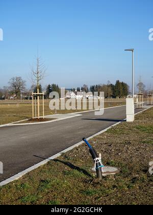 Germania, Baviera, alta Baviera, distretto di Altötting, area edile, di recente sviluppo, strada di accesso, collegamenti, cavi sotterranei Foto Stock