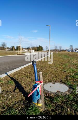 Germania, Baviera, alta Baviera, distretto di Altötting, area edile, di recente sviluppo, strada di accesso, collegamenti, cavi sotterranei Foto Stock