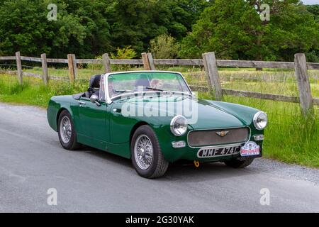 1965 anni '60 verde Austin Healey al 58th Annual Manchester to Blackpool Vintage & Classic Car Run l'evento è un ‘Touring Assembly’ Foto Stock