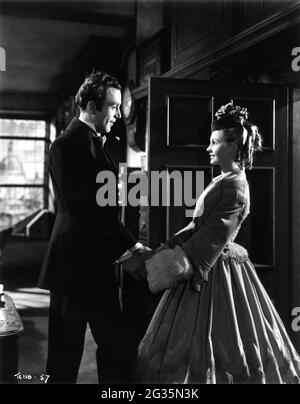 DENNIS PRICE e JEAN SIMMONS in HUNGRY HILL 1947 regista BRIAN DESMOND HURST romanzo Daphne Du Maurier sceneggiatura Terence Young vestiti Eleanor Abbey Two Cities Film / General Film Distributors (GFD) Foto Stock