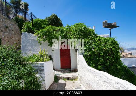 Quartiere di Anafiotika, sotto l'Acropoli, fotografia di strada, Atene, Grecia. Foto Stock
