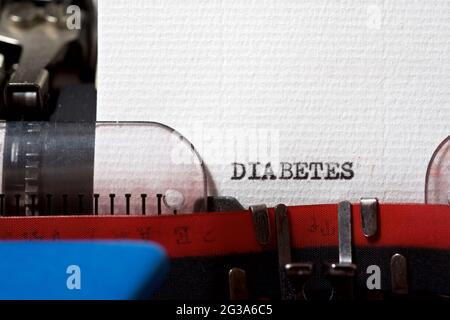 La parola diabete scritto con una macchina da scrivere. Foto Stock
