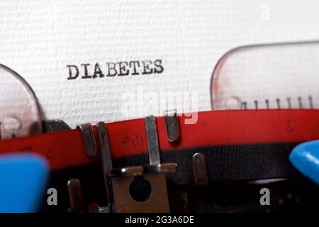 La parola diabete scritto con una macchina da scrivere. Foto Stock