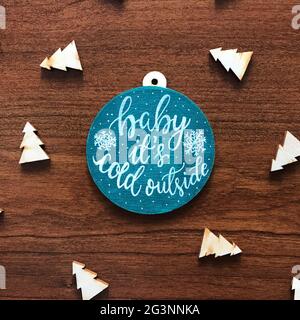 Natale ornamento in legno con canzoni Lyrics Foto Stock