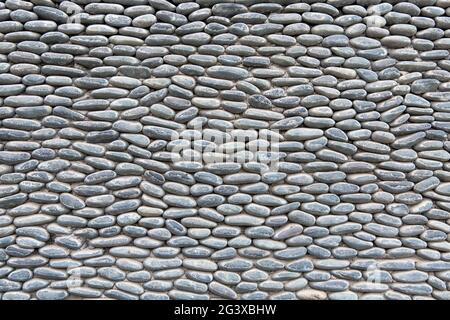 sfondo o struttura di pietre messe una sopra l'altra in modo ordinato e ripetitivo Foto Stock