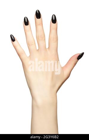 Mano femminile con unghie nere manicure isolato su sfondo bianco. Foto Stock