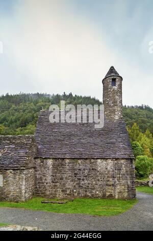 Chiesa di San Kevin a Glendalough, Irlanda Foto Stock