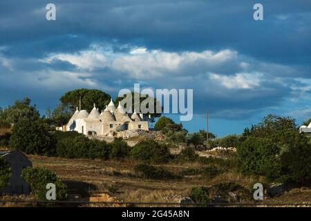 SUD ITALIA, PUGLIA. MARTINA FRANCA, LE CASE TRADIZIONALI DI TRULLI Foto Stock