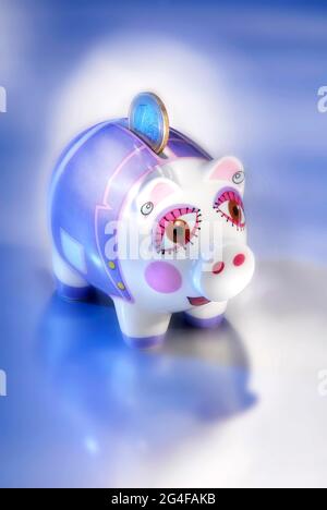 Banca di piggy con una moneta di euro Foto Stock