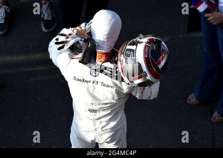 Pilota di Formula 1 con casco di sicurezza, durante il Festival di Milano di F1, 2018, a Milano. Foto Stock