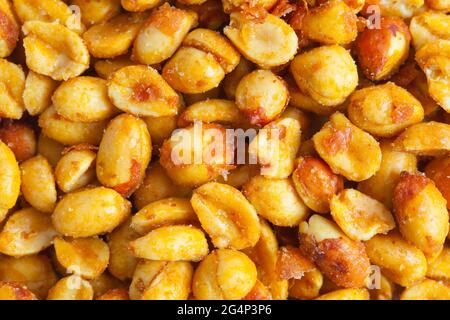 Mucchio di Miele arrosto Peanuts di fondo Texture. Foto Stock