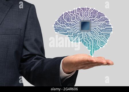 L'uomo d'affari con cervello di intelligenza artificiale si connette al concetto di rete di tecnologia. Foto Stock