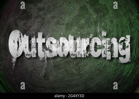 Testo concettuale di outsourcing in background Foto Stock
