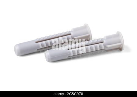 I tasselli in plastica si avvicinano isolati su sfondo bianco Foto Stock