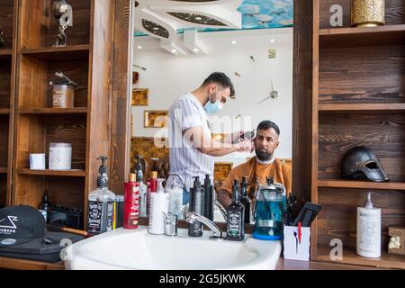 Batley, West Yorkshire. Saqib Hashmi, proprietario della palestra. Foto Stock