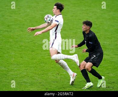 Harry Maguire (a sinistra) in Inghilterra e Kai Havertz in Germania combattono per la palla durante la partita UEFA Euro 2020 del 16 allo stadio Wembley di Londra. Data immagine: Martedì 29 giugno 2021. Foto Stock