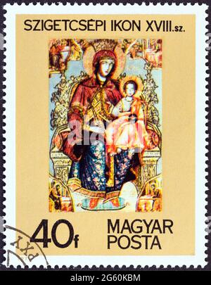 UNGHERIA - CIRCA 1975: Un francobollo stampato in Ungheria mostra Vergine e Bambino 18 ° secolo icona di Szigetcsep, circa 1975. Foto Stock
