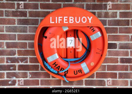 Una linfa a parete montata a Weymouth, Dorset, Inghilterra. Foto Stock