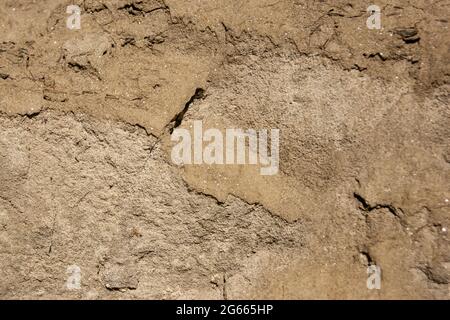 La consistenza della sabbia. Cava di sabbia. Caratteristica struttura di arenaria. Foto Stock