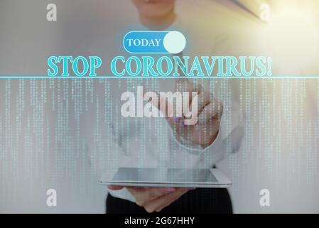 Testo scritto a mano Stop Coronavirus. Business idea malattia campagna di sensibilizzazione lotta per ridurre i casi di COVID19 Lady Holding Tablet premendo su Foto Stock