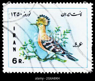 MOSCA, RUSSIA - 18 APRILE 2020: Francobollo stampato in Iran mostra Eurasian Hoopoe (Upupa epps), Iranian new year e primo giorno della serie di primavera, ci Foto Stock