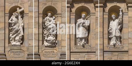 Quattro figure di facciata: Gesù, Maria, Ignazio di Loyola e Laurentius sulla facciata principale della chiesa parrocchiale di San Martino, Bamberga, alta Franconia Foto Stock