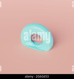 anello galleggiante sgonfio su sfondo pastello. scena minima. concetto fine estate. rendering 3d Foto Stock