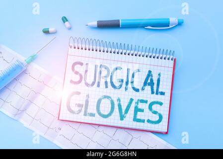 Ispirazione che mostra segno guanti chirurgici. Foto concettuale per proteggere dall'esposizione a materiali infettivi scrittura Medicina della prescrizione Foto Stock
