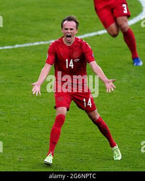 Il danese Mikkel Damsgaard celebra il primo gol della partita durante la partita semifinale UEFA Euro 2020 al Wembley Stadium di Londra. Data immagine: Mercoledì 7 luglio 2021. Foto Stock