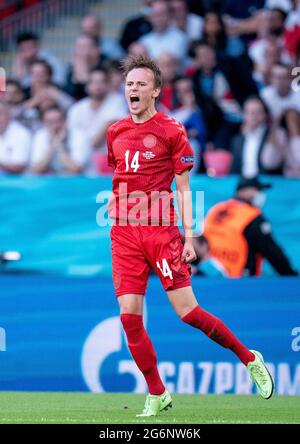 Il danese Mikkel Damsgaard celebra il primo gol della partita durante la partita semifinale UEFA Euro 2020 al Wembley Stadium di Londra. Data immagine: Mercoledì 7 luglio 2021. Foto Stock