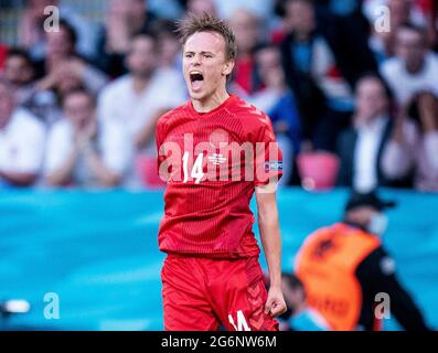 Il danese Mikkel Damsgaard celebra il primo gol della partita durante la partita semifinale UEFA Euro 2020 al Wembley Stadium di Londra. Data immagine: Mercoledì 7 luglio 2021. Foto Stock