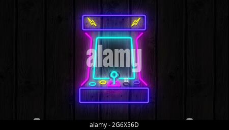 Icone di gioco al neon su sfondo nero 4k Foto Stock