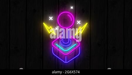 Icone di gioco al neon su sfondo nero 4k Foto Stock