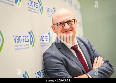 FEBBRAIO-VBO capo economista Edward Roosens pone per il fotografo alla conferenza stampa biennale della VBO-FEB (Federazione delle imprese a Belgi Foto Stock