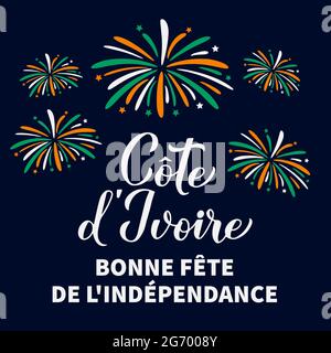 Costa d'Avorio Independence Day calligrafia scritta in francese con fuochi d'artificio. Festa nazionale festeggia il 7 agosto. Modello vettoriale per tipografia po Illustrazione Vettoriale