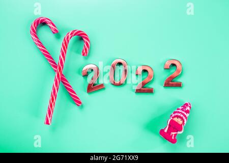 Scheda astratta, Felice anno nuovo 2022 - Metal Number with Golden glitter.Close up of coming year numbers.New Year Celebration and festive background Foto Stock