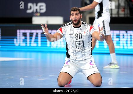 Norimberga, Germania. 11 Luglio 2021. Pallamano: Partita internazionale, Germania - Egitto all'Arena Nürnberger Versicherung. Ahmed Adel dall'Egitto reagisce alla partita. Credit: Daniel Karmann/dpa/Alamy Live News Foto Stock