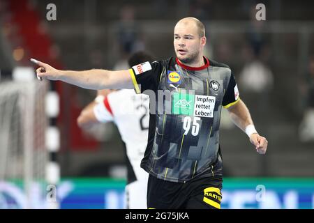 Norimberga, Germania. 11 Luglio 2021. Pallamano: Partita internazionale, Germania - Egitto nell'Arena Nürnberger Versicherung. Paul Drux della Germania celebra il suo obiettivo. Credit: Daniel Karmann/dpa/Alamy Live News Foto Stock