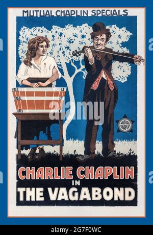 Charlie Chaplin poster di film vintage per il Vagabond / Greenwich Litho. Data di creazione/pubblicazione: N.Y. : Greenwich litho. Co., 1916 chromolithograph Film cinematografico in movimento poster per 'The Vagabond' con Charlie Chaplin, mostrandogli che suona una fiddle per una donna che lava i vestiti in una vasca da bagno. 'Speciali Chaplin a più ruali'. Lone Star Corporation USA Foto Stock