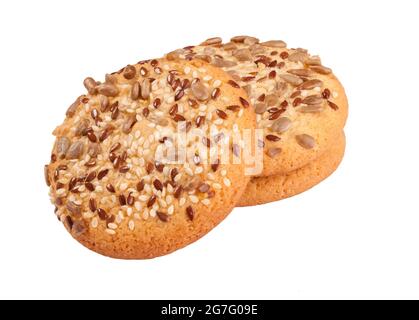 Biscotti shortbread con sesamo, lino e semi di girasole isolati su bianco Foto Stock
