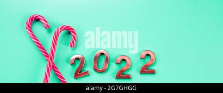 Scheda astratta, Felice anno nuovo 2022.Metal numero con glitter d'oro.primo piano di prossimi numeri anno.Celebrazione di Capodanno e sfondo festivo Foto Stock