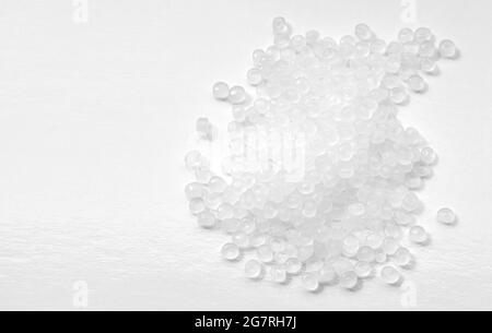 Primo piano immagine di granuli di polipropilene, fuoco selettivo. Foto Stock