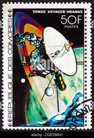 COMOROS - CIRCA 1977: Un francobollo stampato a Comoros mostra Voyager Probe, Urano, esplorazione spaziale, circa 1977 Foto Stock