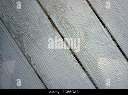 cemento ricoperto di una superficie grigia in cemento come sfondo per la progettazione Foto Stock