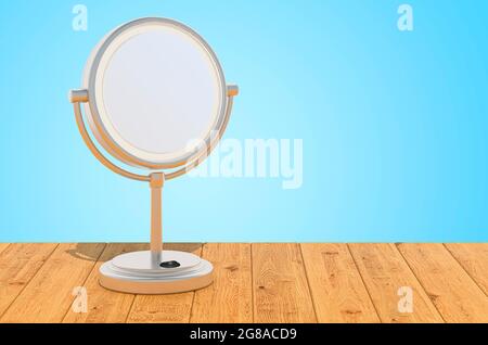 Specchio da trucco illuminato a LED con lente d'ingrandimento sulle tavole di legno, rendering 3D Foto Stock