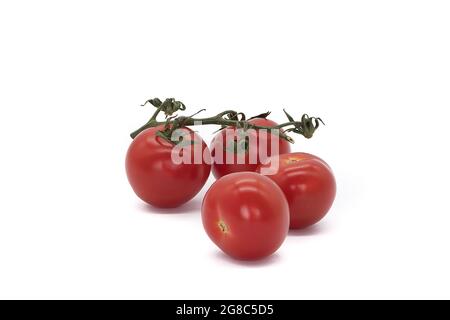 Grossi pomodori rossi isolati su sfondo bianco Foto Stock