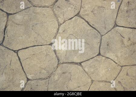 cemento ricoperto di una superficie grigia in cemento come sfondo per la progettazione Foto Stock