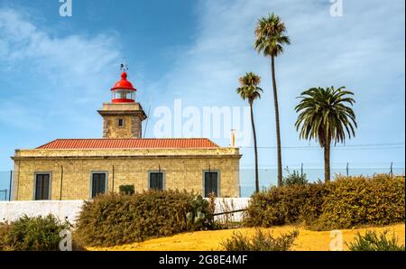 Faro di Ponta da Piedade a Lagos, Portogallo Foto Stock