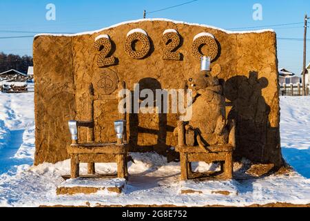 Aer ha fatto nostro di sterco di vacca, villaggio di Uolba, strada di Bones, Repubblica Sakha, Yakutia, Russia Foto Stock